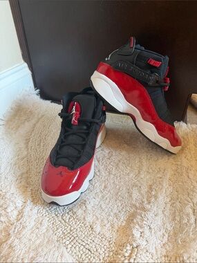Nike Black & Red Air Jordans. Size kids 4Y- Womens 5-6